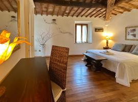 La Mansarda di Casciano، فندق في مورلو