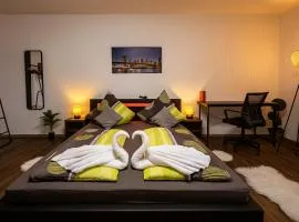 Homefeld Suite - Elegante und moderne Ferienwohnung zentral in Hünfeld bei Fulda mit Küche, kostenlosem Parkplatz und WLAN