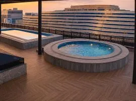 Zeta Mall Luxury Apartments by Wall Street Rooftop Pool Access