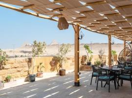 Pyramidia Serene with Rooftop, Pool & pyramids view, hotel v destinaci ‘Ezbet `Abd el-Ḥamîd