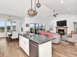 Stunner with Lake Mountain Views and Private Hot Tub
