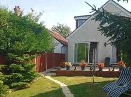 Central to town, 4 bedrooms, sleeps 8, parking for 4 plus cars