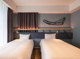 QuintessaHotel Osakaumeda Comic&Books，大阪的飯店