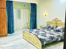 Comfort Family suites, ξενοδοχείο με υδρομασάζ στο Ισλαμαμπάντ