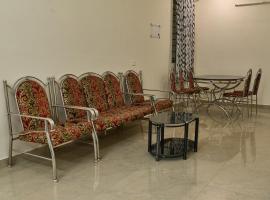 Immanuel Homestay, Kalathipady, Kottayam, Flat E، فندق في كوتايم