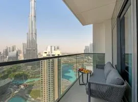 Direct Burj & Fountain Views - Designer 4BR Haven!
