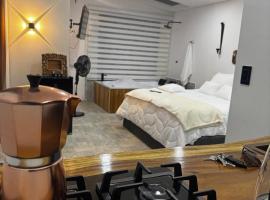 Sempiterno- la cabaña Whispering Wind, hotel i La Vega