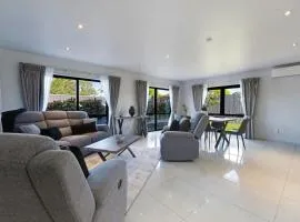 Modern Spacious Home with Backyard and Parking