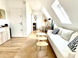 Appartement Douillet - Vue Mer - Piscine/ Tennis, hotel en Cabourg