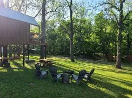 Tree House Glamping Destination near the Ozarks, with River Access for Swimming and Fishing