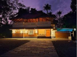 Acrewood Farmhouse - Pool Villa, hotel in Vāzhākulam