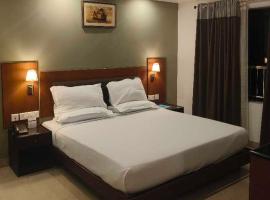 POP 84052B Sreekaryam Inn, hotel v destinaci Trippapur