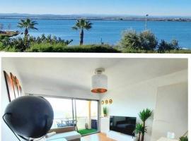 Appartement 1ere ligne piscine terrasse au bord de la plage front de mer avec 6 vélos，位于帕拉瓦莱弗洛的酒店