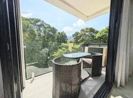 Torres del Mar rainforest-view two-bedroom condo