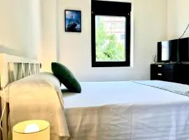 Suites y habitaciones con baño en Villa céntrica