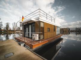 Sch&ouml;nes Hausboot in H&ouml;xter, b&aring;d i Boffzen