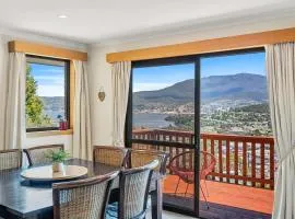 The Lookout with City water and Mountain views