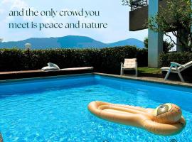 Residence Collina d'Oro, ξενοδοχείο σε Collina d'Oro