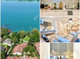 Snug Stays 2 - Design 1-Zimmer-Studio am See mit Terrasse, Garten, Badestelle vor dem Haus