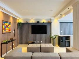 Apartamento Guarujá, com sacada vista mar! Pé na areia, Lindo! โรงแรมในกัวรูจา