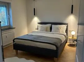 Moderne Ferienwohnung mit Terrasse und Gartenblick