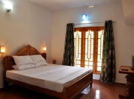 Camelia HomeStay, ξενοδοχείο σε Pooppara