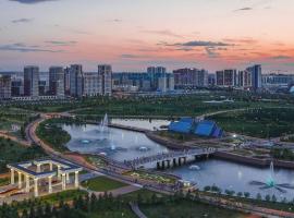 Апартаменты рядом с Ботаническим садом, EXPO и Barys Arena, hotel in Astana