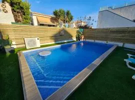 Private Villa with Heated Swimming Pool, Roof Top Solarium & Garden