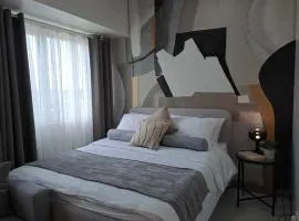 Homey Roxas Blvd Condo Pool Parking WiFi