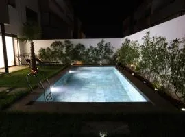 Dar Bouazza Luxury apartment with pools garden sports courts parking near the sea