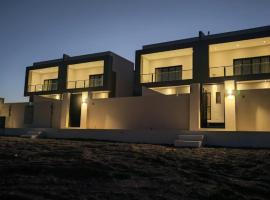 Dune View Luxury Villas, hotel in Ḩawīyah