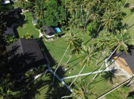 Island Time Surf Resort, hotel in Lasikin