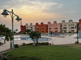 Amer Group Villas and Chalets on the Pool，位于艾因苏赫纳的酒店