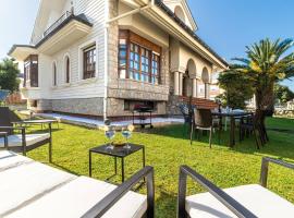 Chalet con Jardín junto a la Playa de Berria，位于桑托尼亚的酒店
