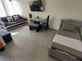 Apartamento Cerca a la playa, Piscina, Wifi, AC