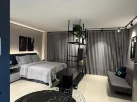 Flat de luxo piscina rooftop e vista para o parque