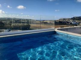 Sunsets Duplex Penthouse Gozo, ξενοδοχείο σε Kerċem