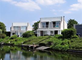 Vakantiewoning direct aan het Veerse Meer, Hotel in Kortgene