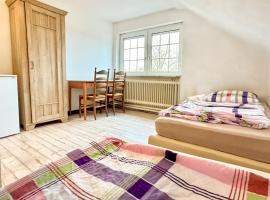 Ruime accommodatie voor 10 personen in Marx, Hotel in Friedeburg