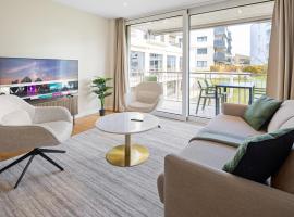 Visionary Hospitality Embrach, Zürich - Premium Apartments with Free Parking, Washer, Kitchen, Rooftop Terrace, Lounge, Bus Stop, Train Station, 15' Airport、Embrachのホテル