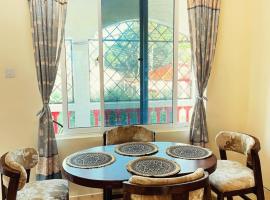 Coastal Bliss 2BR Beach Getaway in Kanamai, Mtwapa, hotel con estacionamiento en Mtwapa