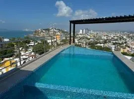 Depa con terraza panoramica al mar y la ciudad