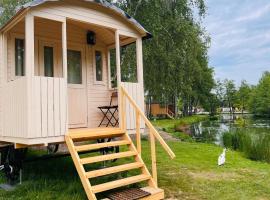 Camping Papillon Kinrooi - Pipowagen 2p terras, шалет в Kinrooi