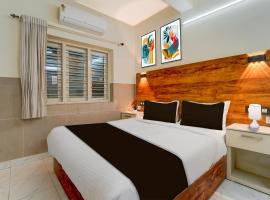 Super Townhouse Green Field Stadium Karyavattom, hotel en Kazhakuttam