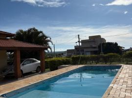 Casa no condomínio Ninho Verde l, hotel a Quadra