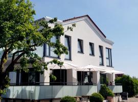 Haus Achtern Diek in erster Reihe am Meer、フェーマルンの格安ホテル