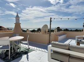 Lagoa में, होटल Marinha Coast Vue mer, rooftop, piscine, à Praia da Marinha
