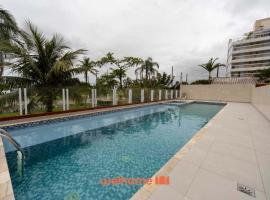 Apto em Bertioga a beira mar com varanda gourmet, hotel in Ilha Monte Pascoal