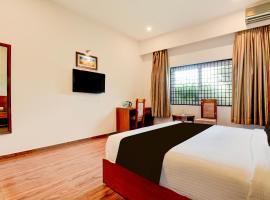 Super Townhouse Oak Sri Mahadeshwara Convention Centre Formerly Shri Aprameya Resort, hotel v destinaci Hārohalli