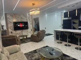 شقة فندقية بغرفتين قرب مول مصر وميدان جهينة